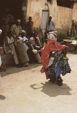 Gelede masqueraderA Gelede masquerader dancing in the courtyard of the Ibara palace in Abeokuta, Nigeria.