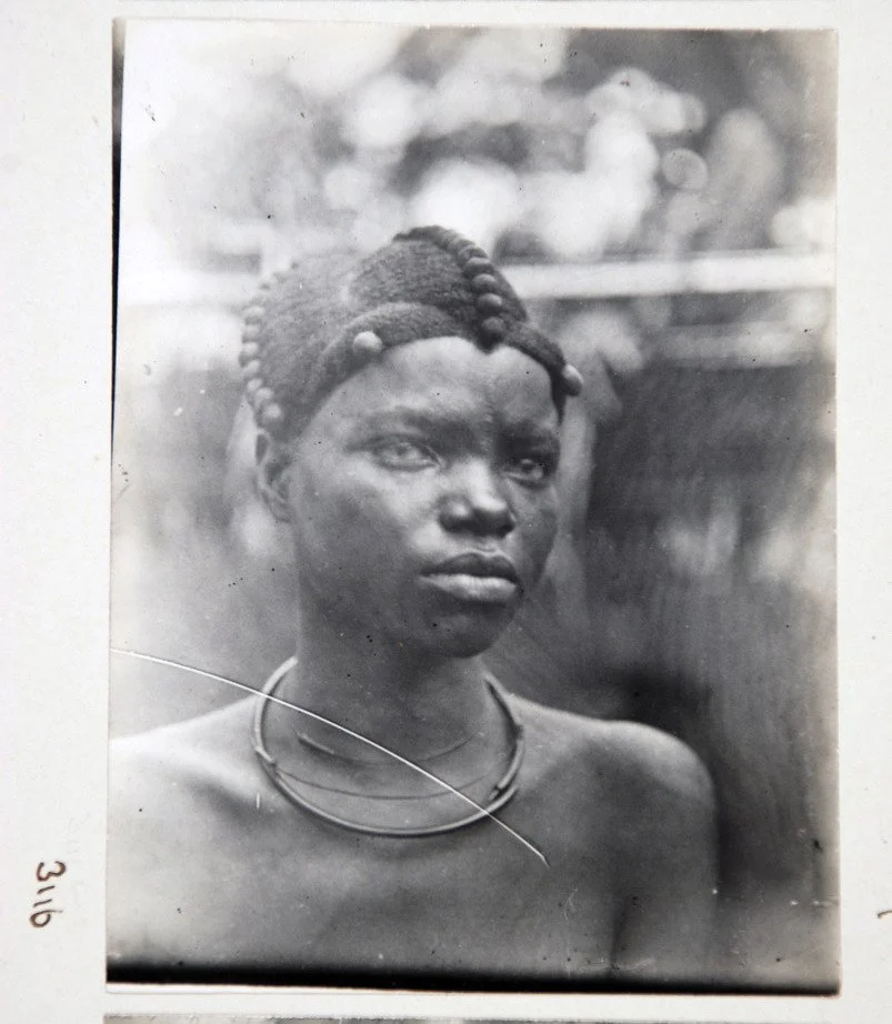 An Igbo girl in the photo album of British colonial government anthropologist Northcote Thomas, taken c. 1910-11. MAA Cambridge.