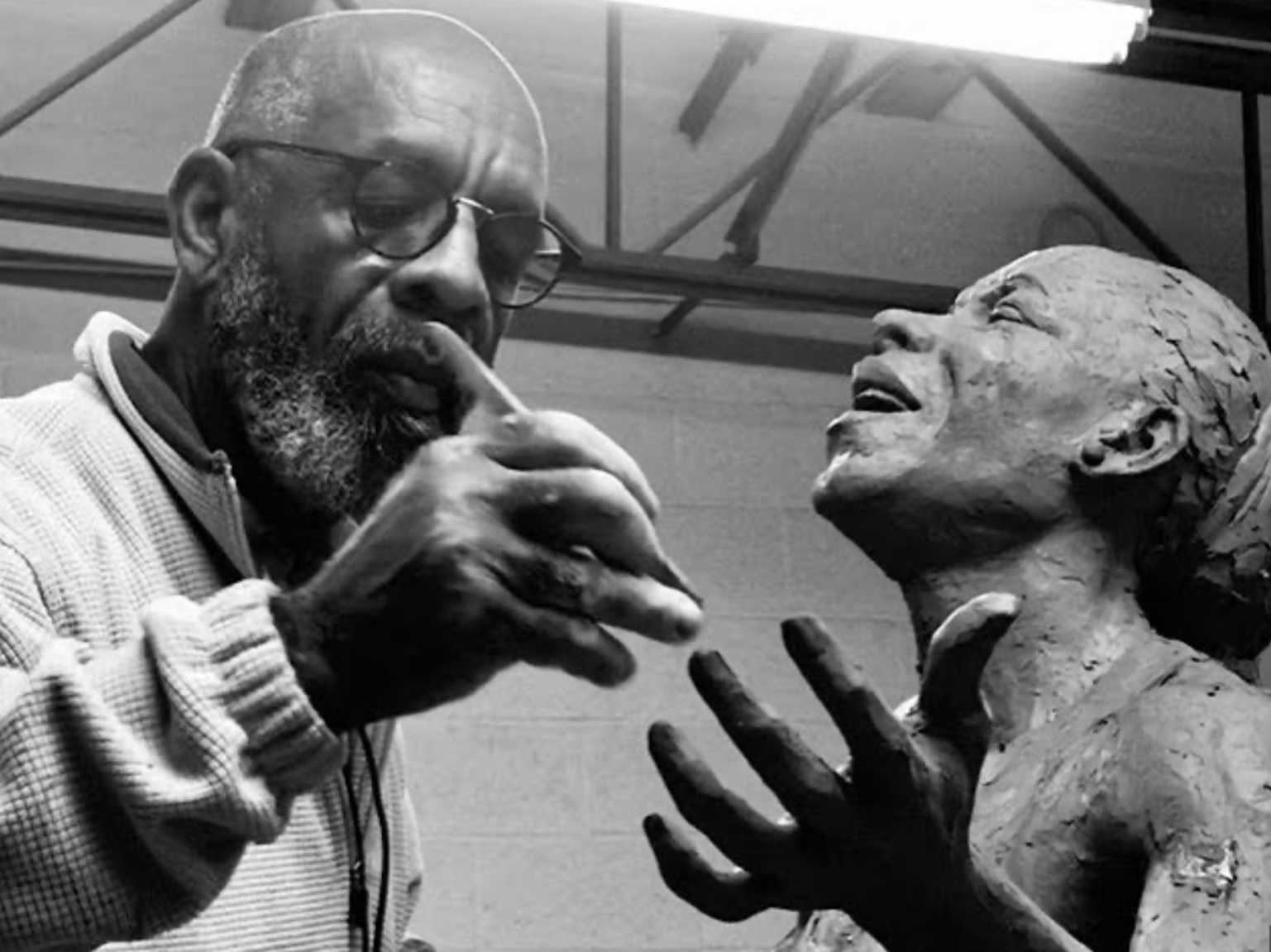 Jamaican Sculptor Basil Watson. "This personal description of his lifelong passion is what defines the work of Jamaican artist, Basil Barrington Watson. For more than 40 years, he has been translating life's most important attributes - positive emoti