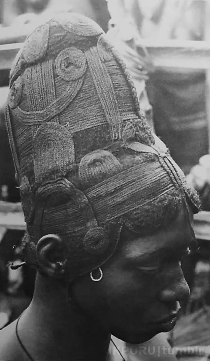 Young married woman from Achalla Awka wearing a wig, north-central Igbo area, Nigeria. Photo: K. C. Murray, 1939.