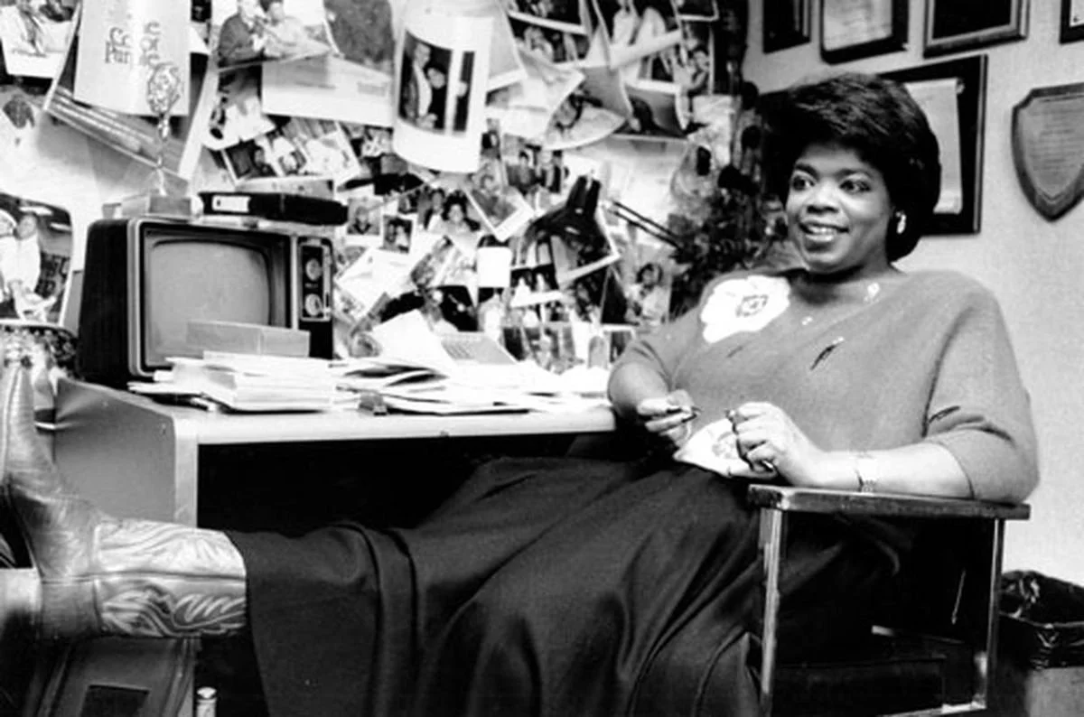 Oprah Winfrey puts her feet up as she relaxes in her office following a morning broadcast in Chicago, Ill., Dec. 18, 1985.