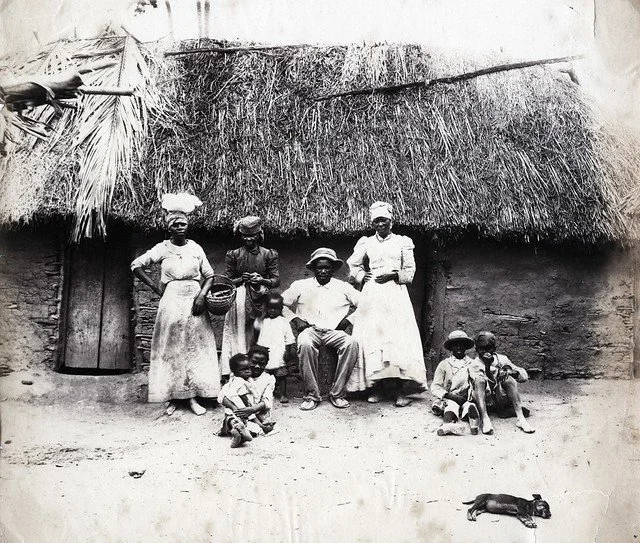 Cleary, J.W. (1890). Jamaicans. [Photograph]. The Caribbean Photo Archive. https://www.caribbeanphotoarchive.com