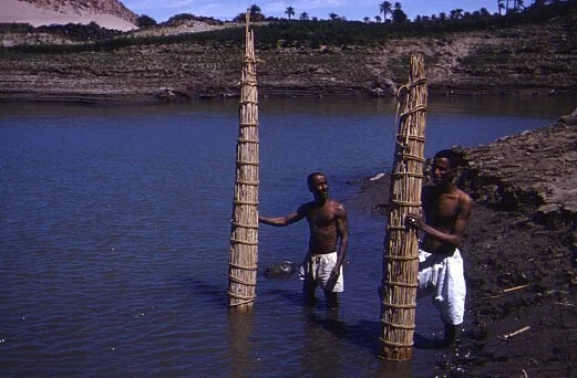 Nubian swimmers with straw “rafts,” Sena. 
Emery, J. (Photographer). Nubian swimmers with straw “rafts,” Sena. Flickr. 
© James Emery. Licensed under the Creative Commons Attribution 2.0 Generic (CC BY 2.0) license: https://creativecommons.org/licens