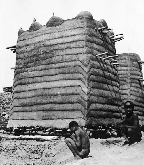 Traditional Tamberma (Batammaliba) architecture, specifically the fortified houses known as takienta (or sikien) found in the Koutammakou region of Togo and Benin. This unique style of earthen architecture is a UNESCO World Heritage site.