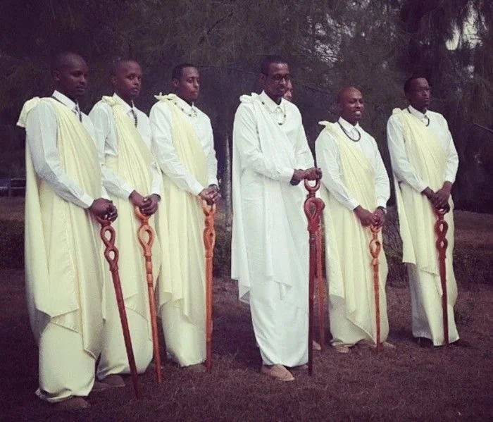 Rwandan groom and groomsmen in Mushanana Traditional Attire.