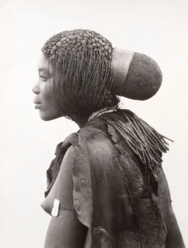 Owambo braided hairstyle, circa 1920s. Sourced from Vintag.es.