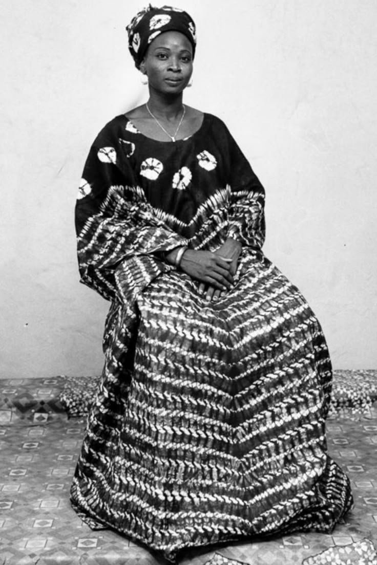 A Senegalese woman wearing a bazin boubou, photographed by Malick Sidibé.