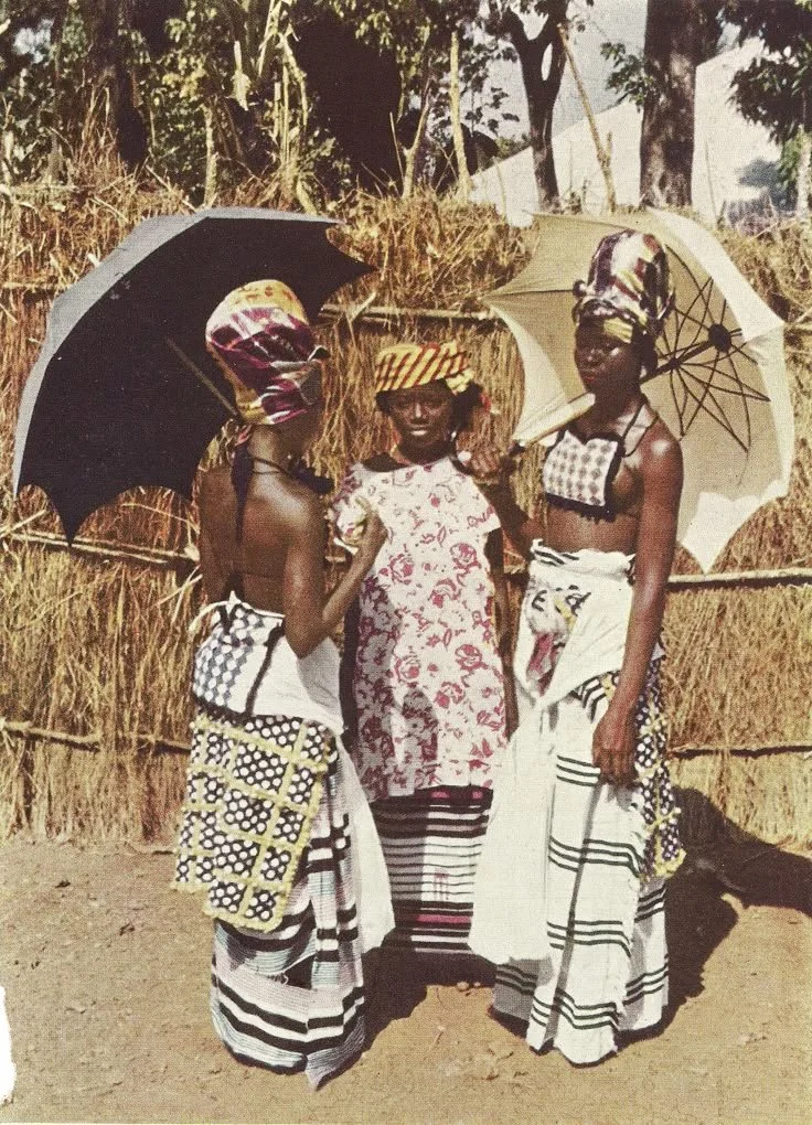 Susu girls of French Guinea wearing handwovn textiles and fabrics, circa. 1950s. 