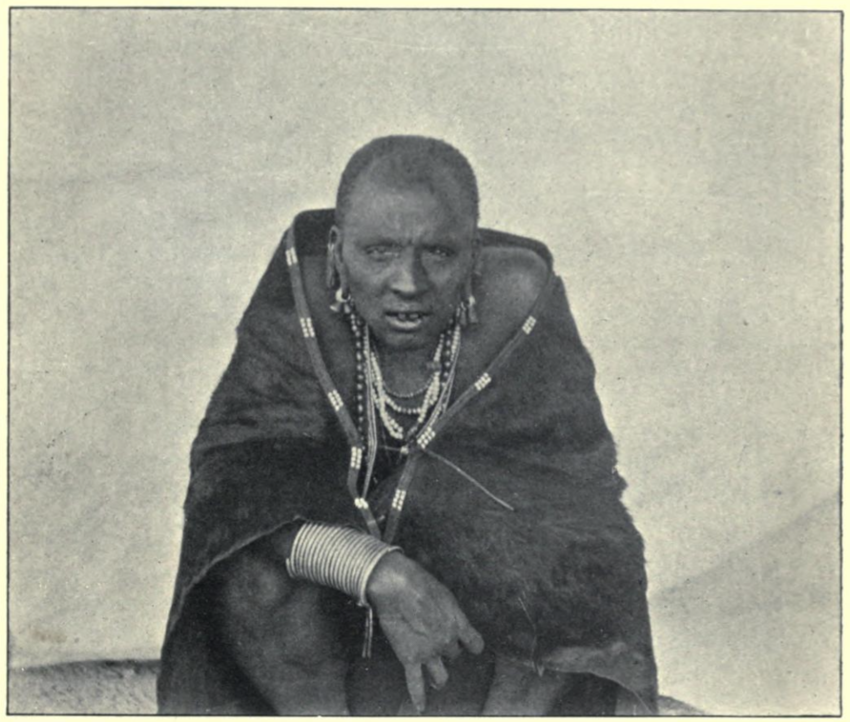 Hollis, Sir Alfred Claud. The Masai: Their Language and Folklore. Introduction by Sir Charles Eliot. Oxford: Clarendon Press, 1905. (Page 20 - Masai elder wearing a fur coat which is supposed to resemble a cobras hood.)