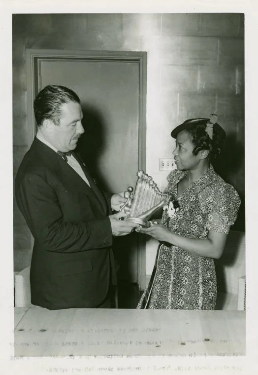 Augusta Savage presenting model of "Lift Every Voice and Sing (The Harp)" to Grover Whalen — Source: Manuscripts and Archives Division, The New York Public Library. "Art - Sculpture - Harp (Augusta Savage) - Augusta Savage presenting model to Grover 