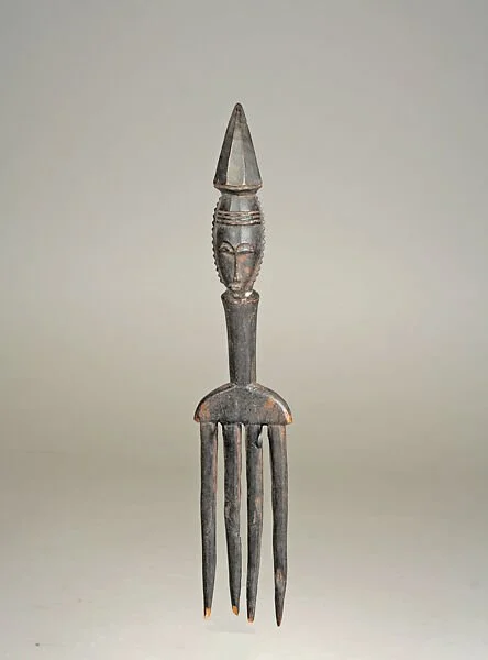 Comb with Figure, Baule people, 19th –mid-20th century. The Metropolitan Museum of Art