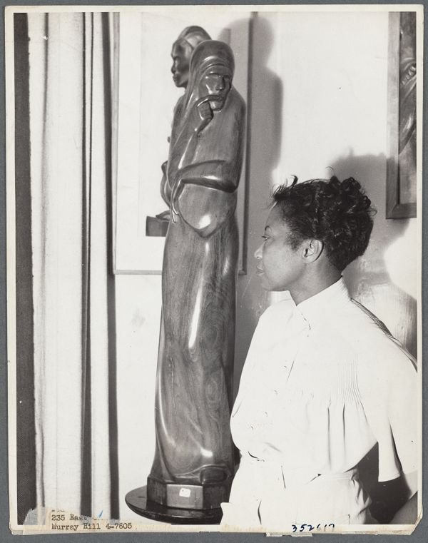 "Envy" sculpture in wood (1938) — Source: Schomburg Center for Research in Black Culture, Photographs and Prints Division, The New York Public Library. ""Envy" sculpture in wood" The New York Public Library Digital Collections
