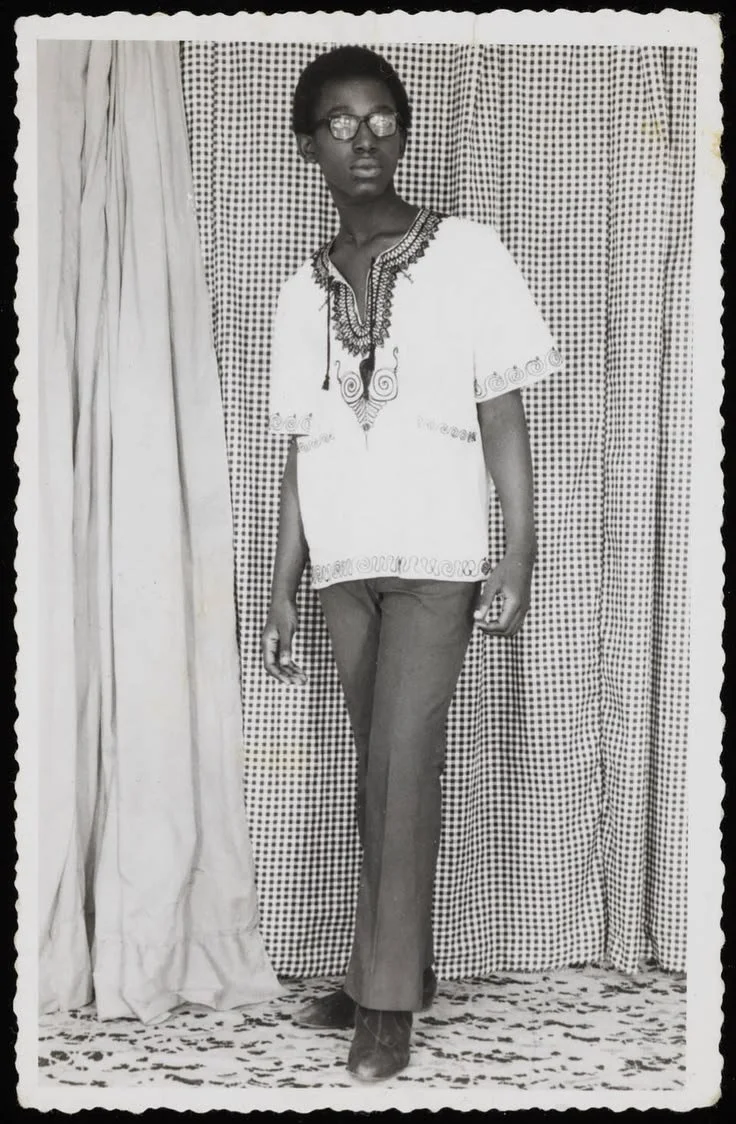 Kofi Owusu wearing a tradiitional dashiki, 1970.