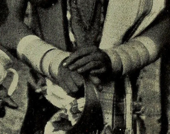 An Igbo woman wearing odu ivory bangles.