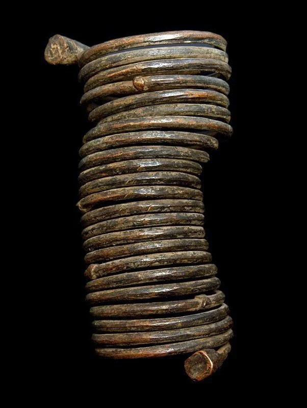 An 20th-century Igbo copper coil currency piece, also known as manilla, from Nigeria. Manilla was used as a form of money and stored wealth in West Africa.