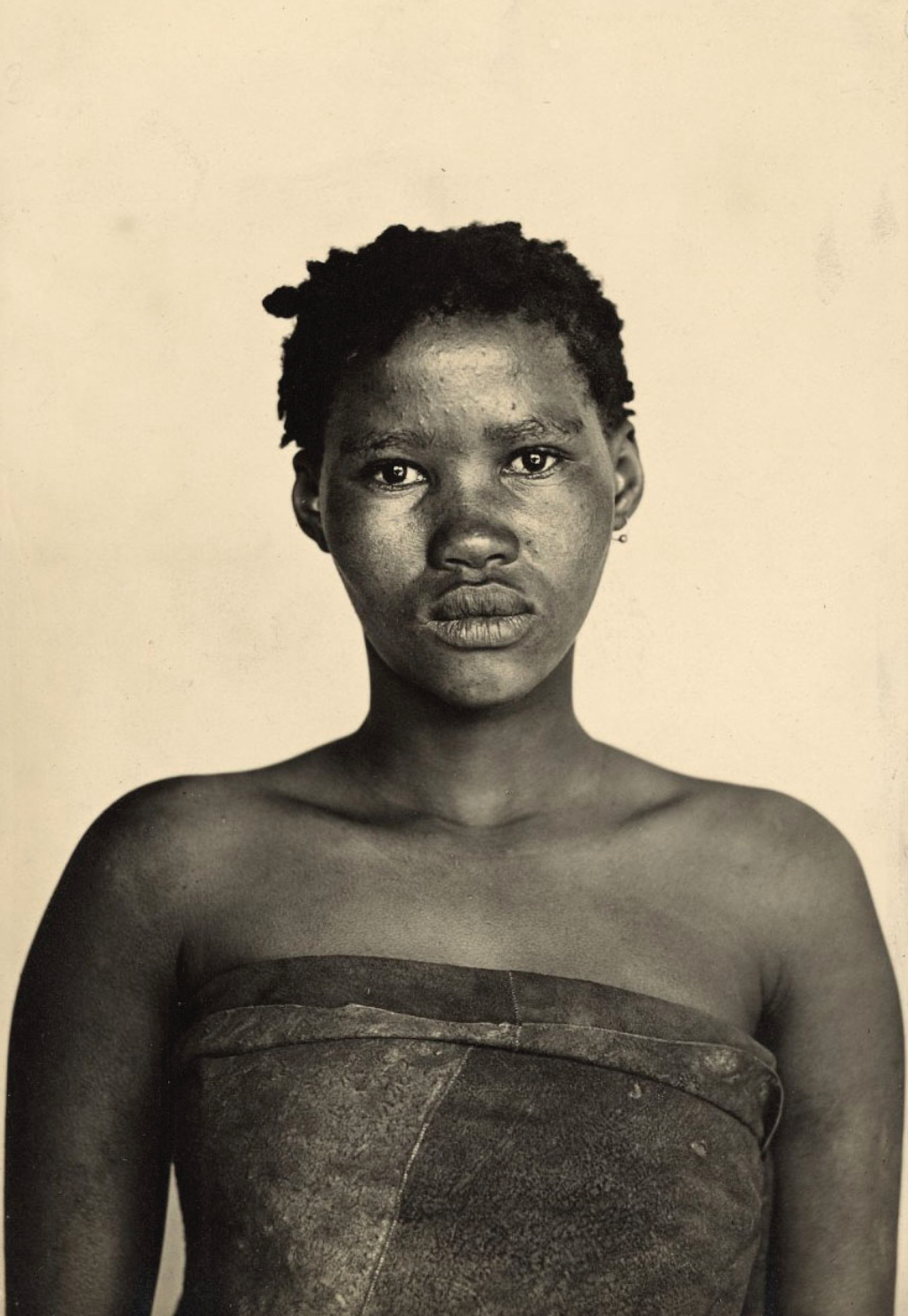 [Portrait of a young woman with short natural hair] [Photograph]. Art Blart. https://artblart.com/wp-content/uploads/2013/08/duggan-cronin-korana-girl.jpg