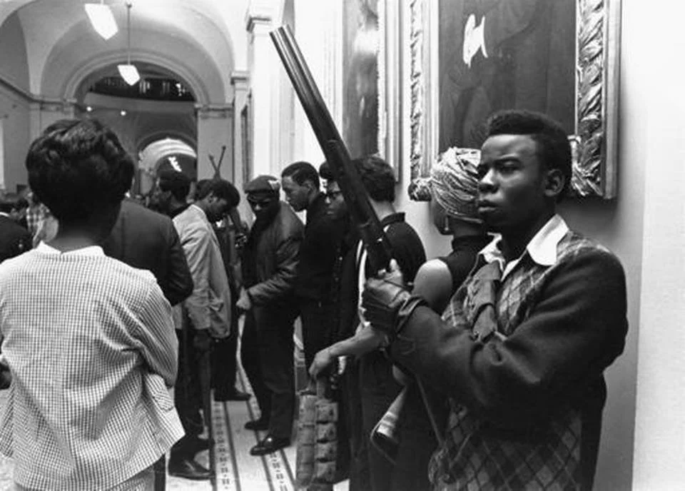 Armed members of the Black Panther Party stand inside the California Capitol in 1967. (Walt Zeboski / Associated Press )