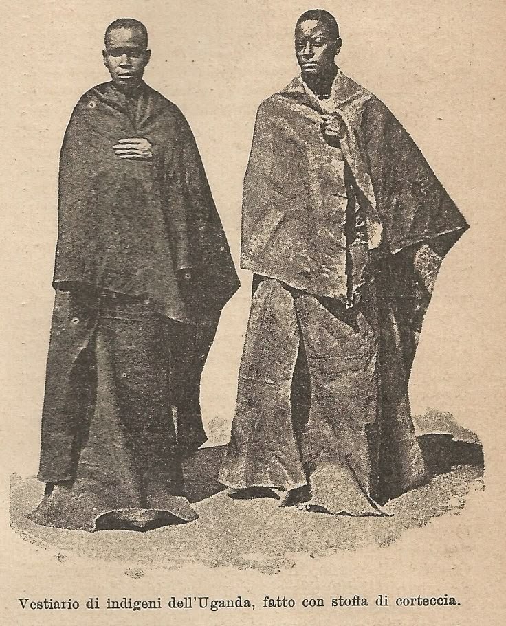 Two men from Uganda wearing traditional bark cloth (stoffa di corteccia) clothing. 