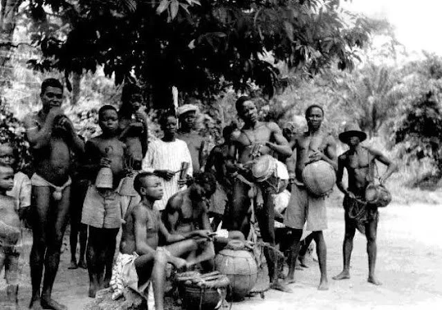 Igbo tribe members playing various musical instruments 