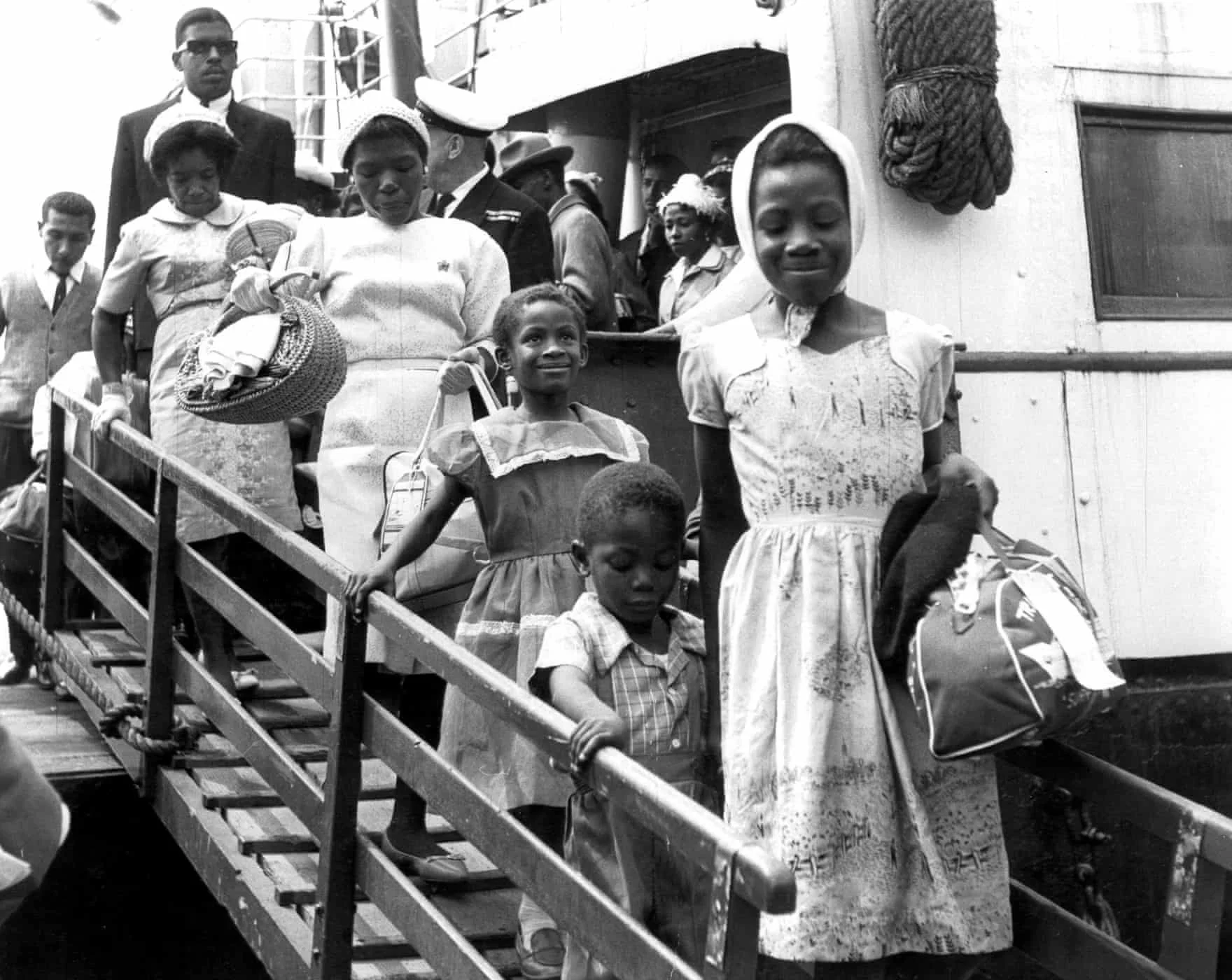  A family disembark from the Begona liner
Photograph: Topham Picturepoint/Press Association Images. 'Windrush arrivals embark on a new life in UK – archive photos', Joanna Ruck, The Guardian, Apr 2018. 