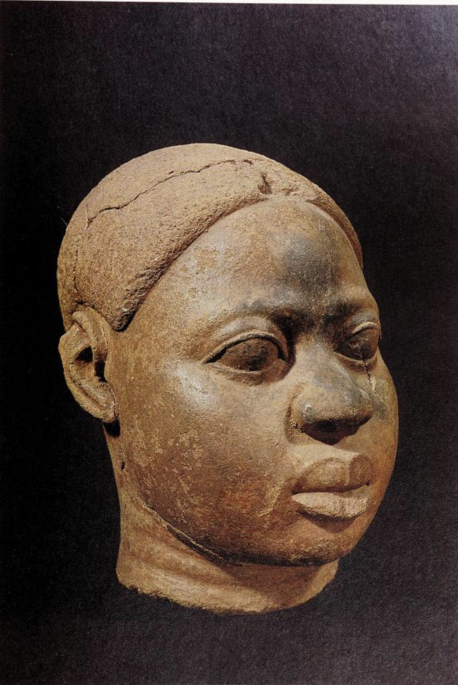 Terracotta representation of a human head with globular eyes uncharacteristic of Ife. probably between 12th and 15th centuries A.D. p.57. from Two thousand years, Nigerian art (1977).