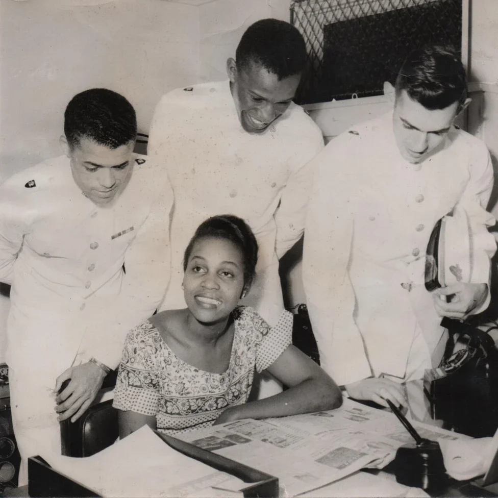 BBC News. “Dorothy Butler Gilliam: ‘I am Not a Maid, I Am a Reporter’.” Image "Dorothy Butler Gilliam pictured with West Point graduates, while working for the Louisville Defender in about 1954". August 22, 2021. https://www.bbc.co.uk/news/stories-58