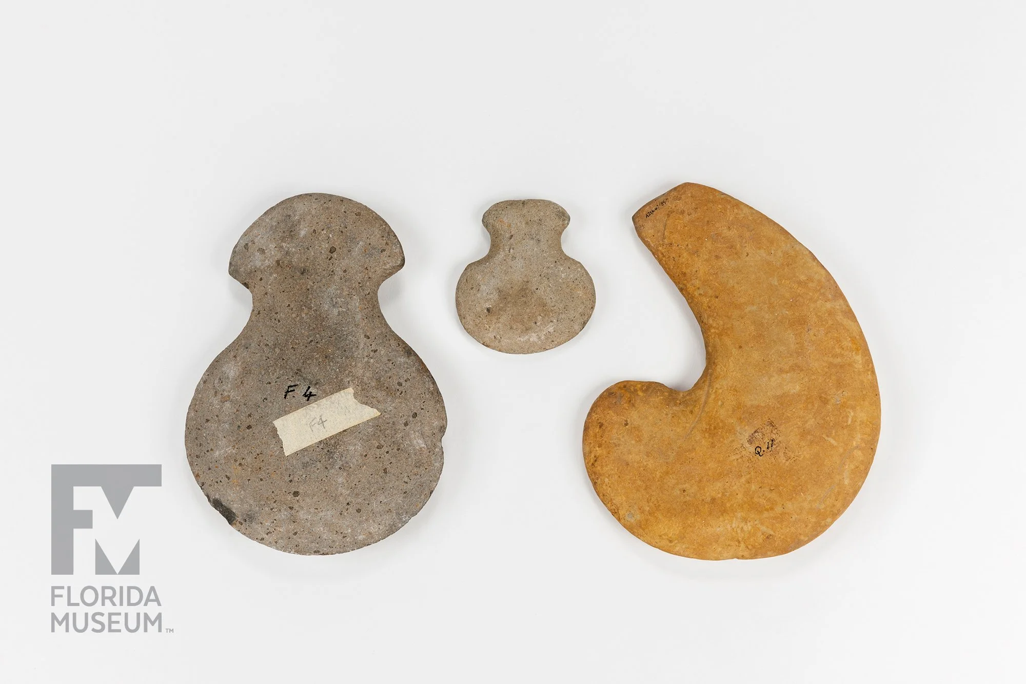 Stone Hoes. Circa AD 200–1400. Indigenous Caribbean peoples, Grenada; Caribbean. Basalt stone implements shaped into heavy, axe-like forms through percussion and grinding techniques, likely used as digging hoes for preparing agricultural soils such a