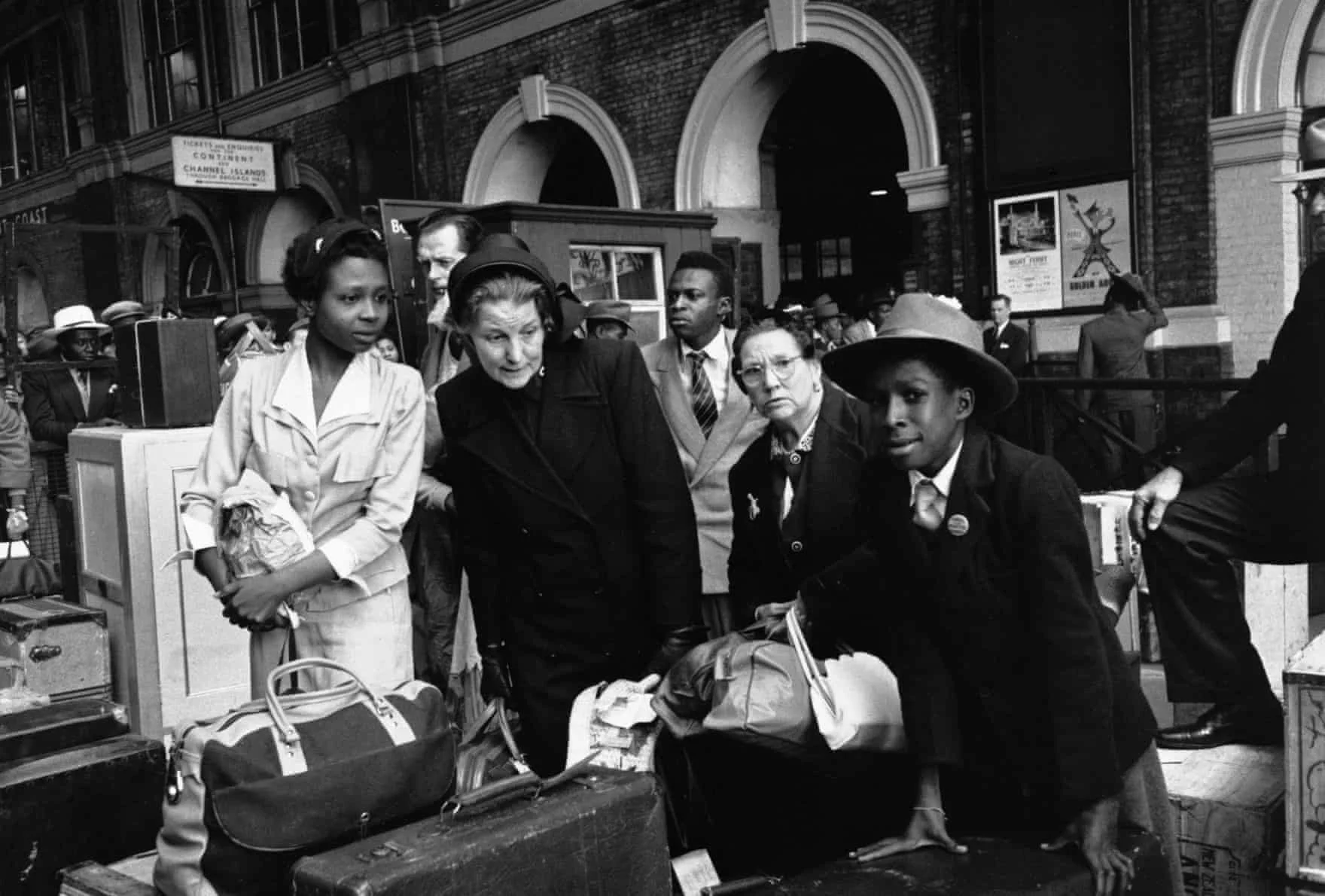  Salvation Army charity workers assist new arrivals at Victoria station
Photograph: Hulton Deutsch/Corbis via Getty Images. 'Windrush arrivals embark on a new life in UK – archive photos', Joanna Ruck, The Guardian, Apr 2018. 