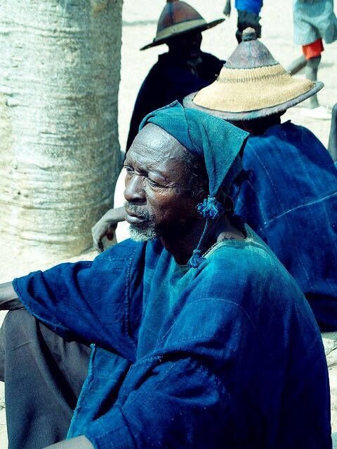 Dogon men in their traditional indigo garments.