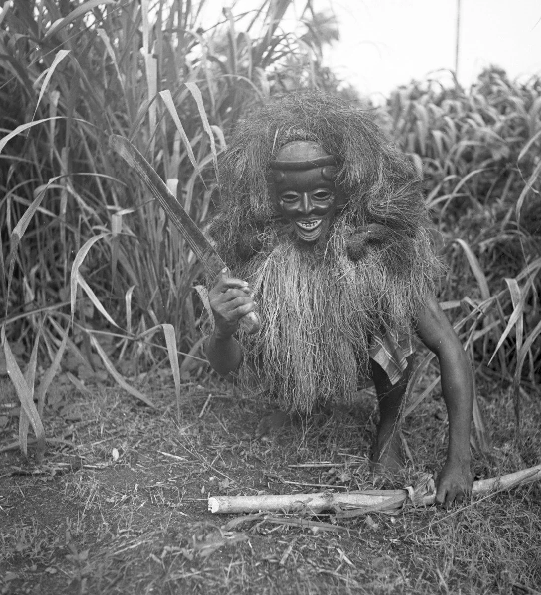Ekpo, the mask representing ghosts. Ibibio culture which has also been borrowed by some Igbo groups. Photo: G. I. Jones, c. 1930s, near Ikot Ekpene. MAA Cambridge.