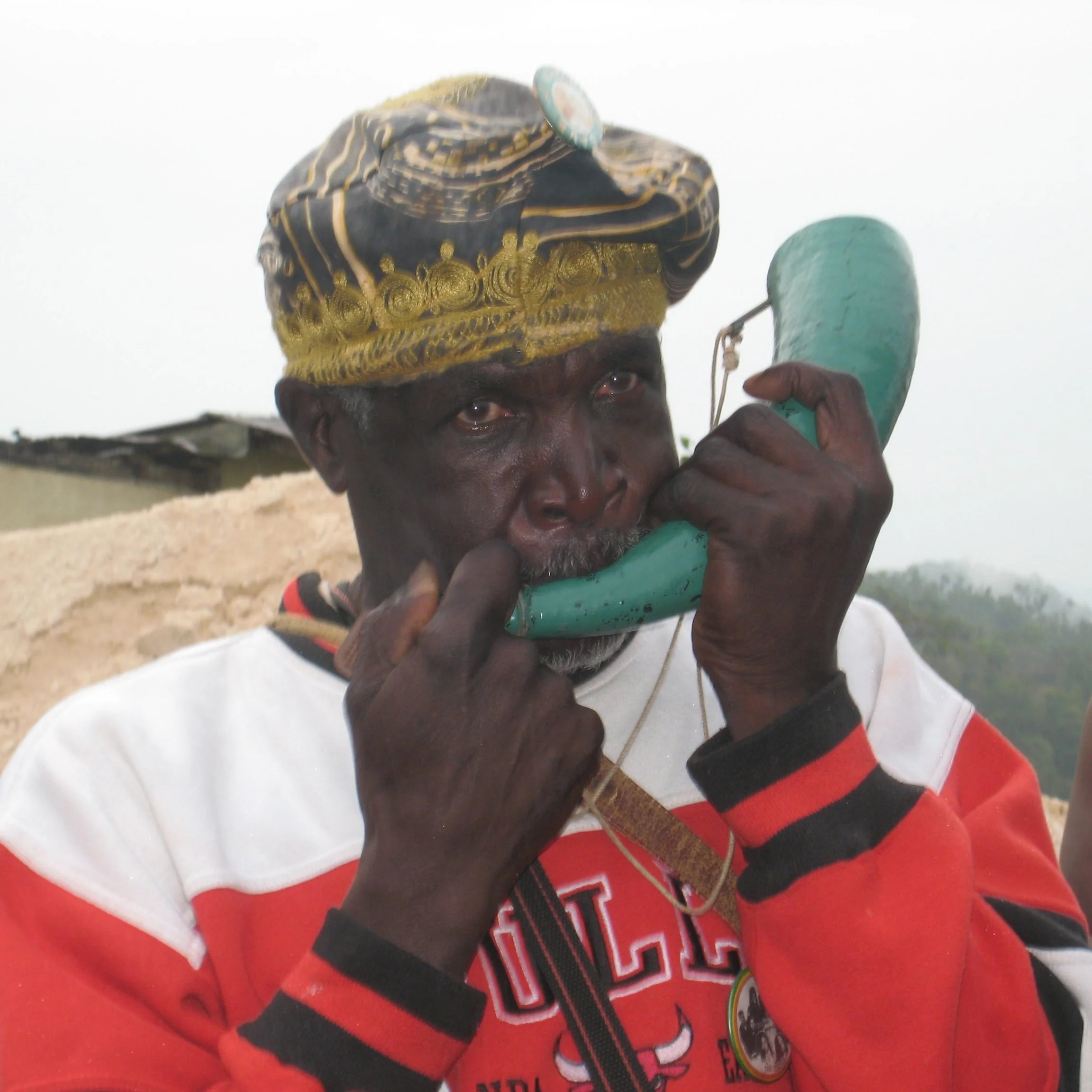 "This Gentleman is the official abeng blower for the Accompong Maroons. The abeng is blown at special events such as funerals." March 1, 2008.