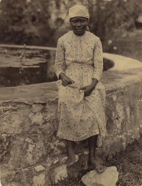 Valentine and Sons. (1891). Girl in Jamaica. [Photograph]. The Caribbean Photo Archive. https://www.caribbeanphotoarchive.com