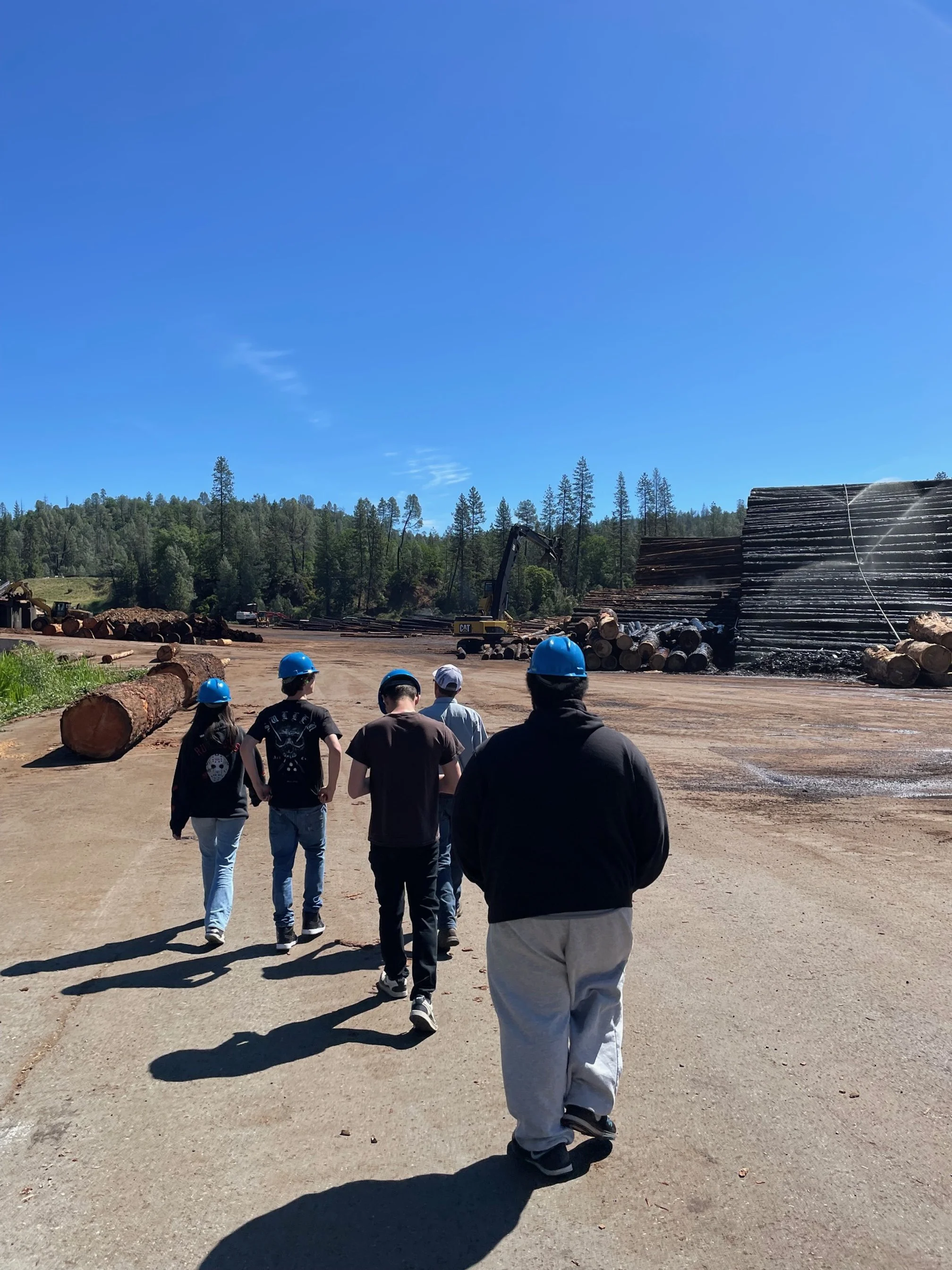 Local Employment Exposure.
The Trinity Lumber Company graciously hosted a cadre of students so that they could tour the lumber yard and mill in Weaverville.