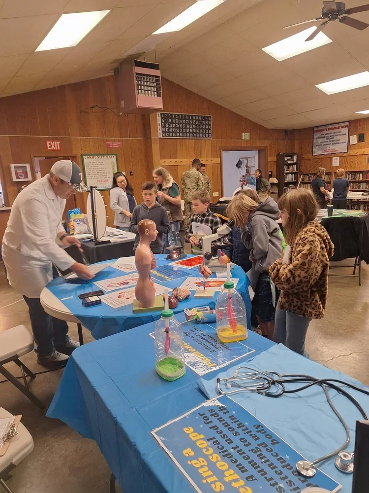 2024: Seventy-five (75) TK-12 students from Southern Trinity learned about various medical careers by exploring anatomical models, examining blood cells under a microscope, and watching their heart rate increase after rigorous stair-stepping exercise