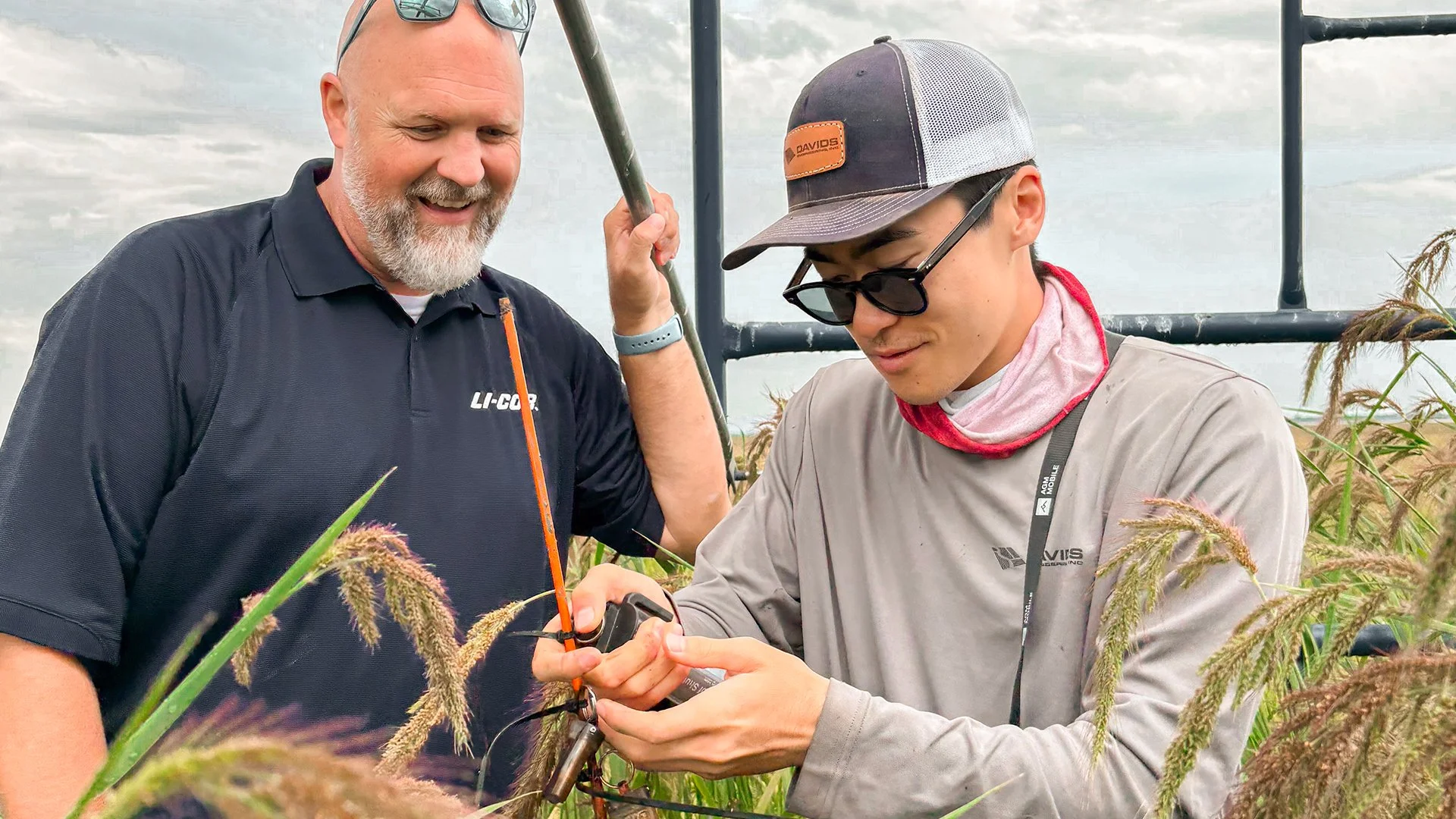 People working with hardware on the field used to monitor water inflows and quality