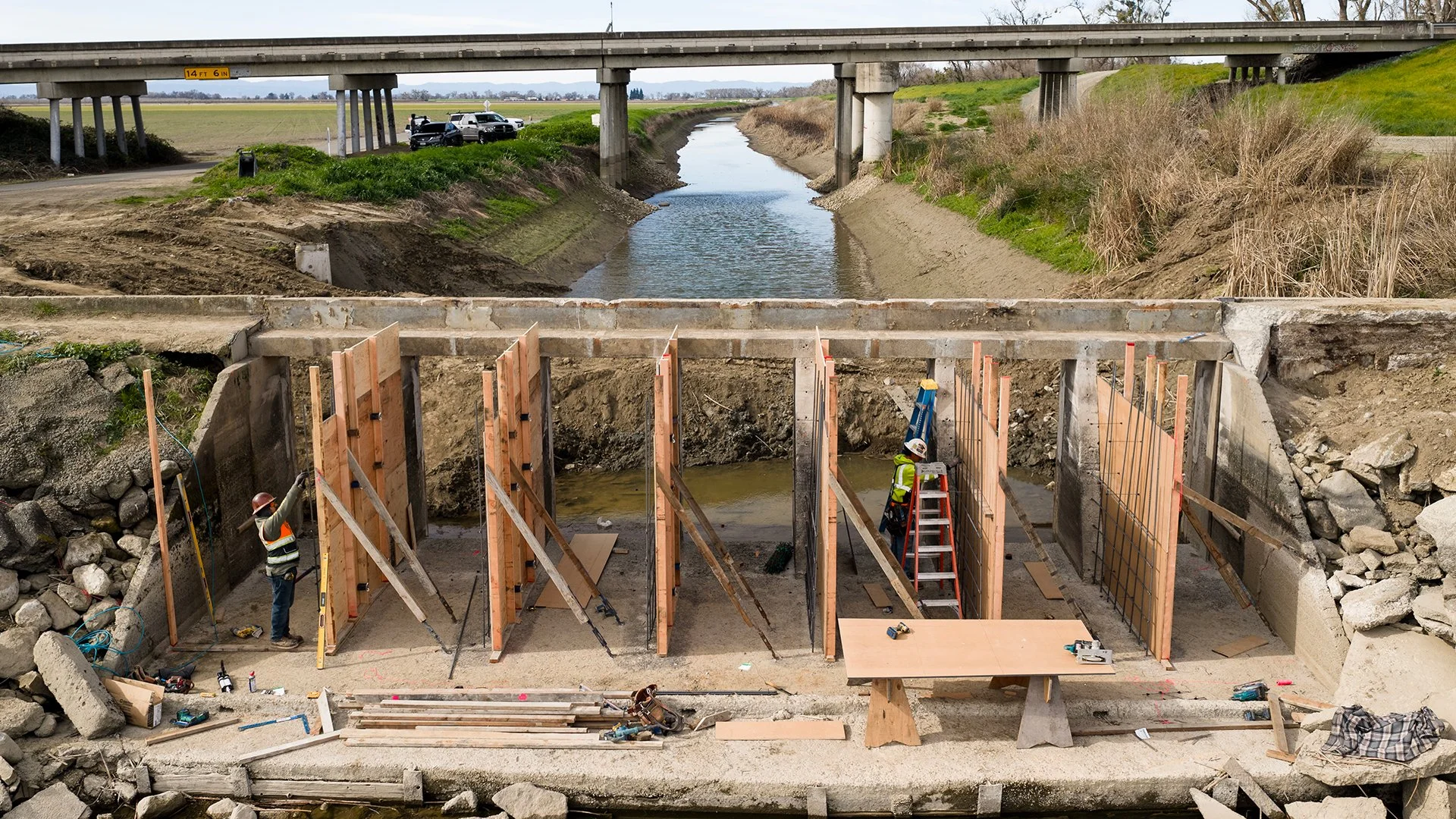 photo of construction workers building the canal