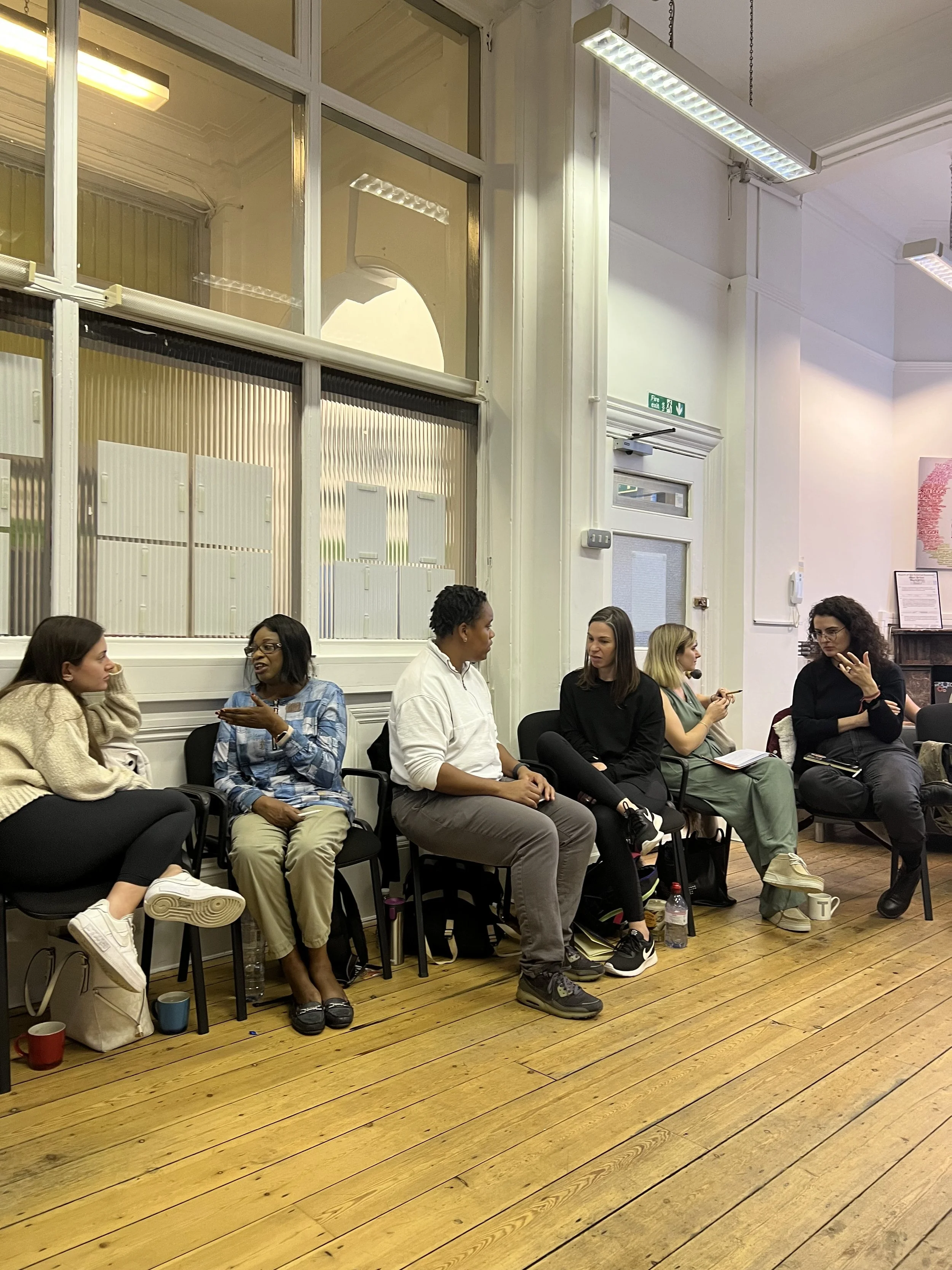 Students engaging in conversation about their clinical work, supervision and the therapeutic relationship