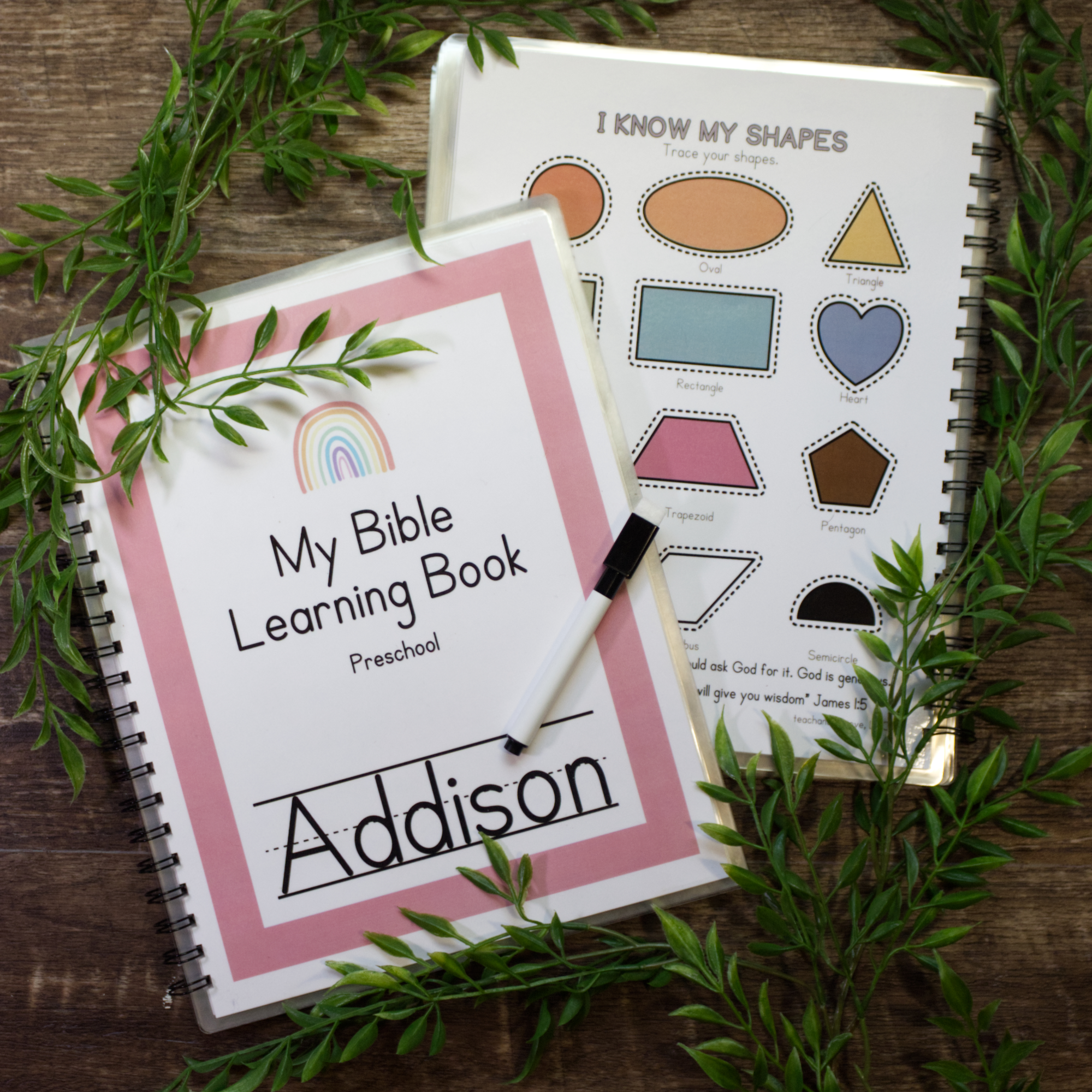 An image of a dry-erase, reusable Christian Preschool Workbook with a dry erase marker.