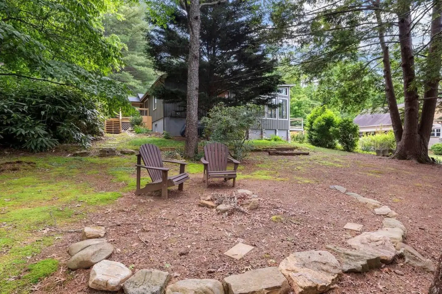 fire pit and adirondack chairs Rustling Pine