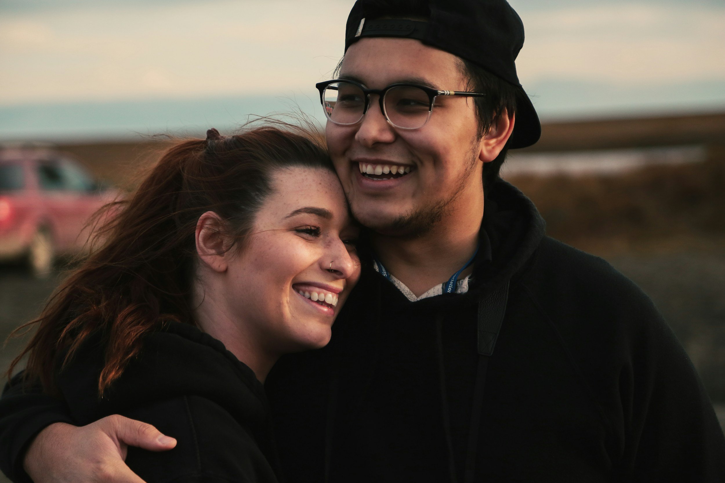 Happy couple smiling after couples therapy in NYC