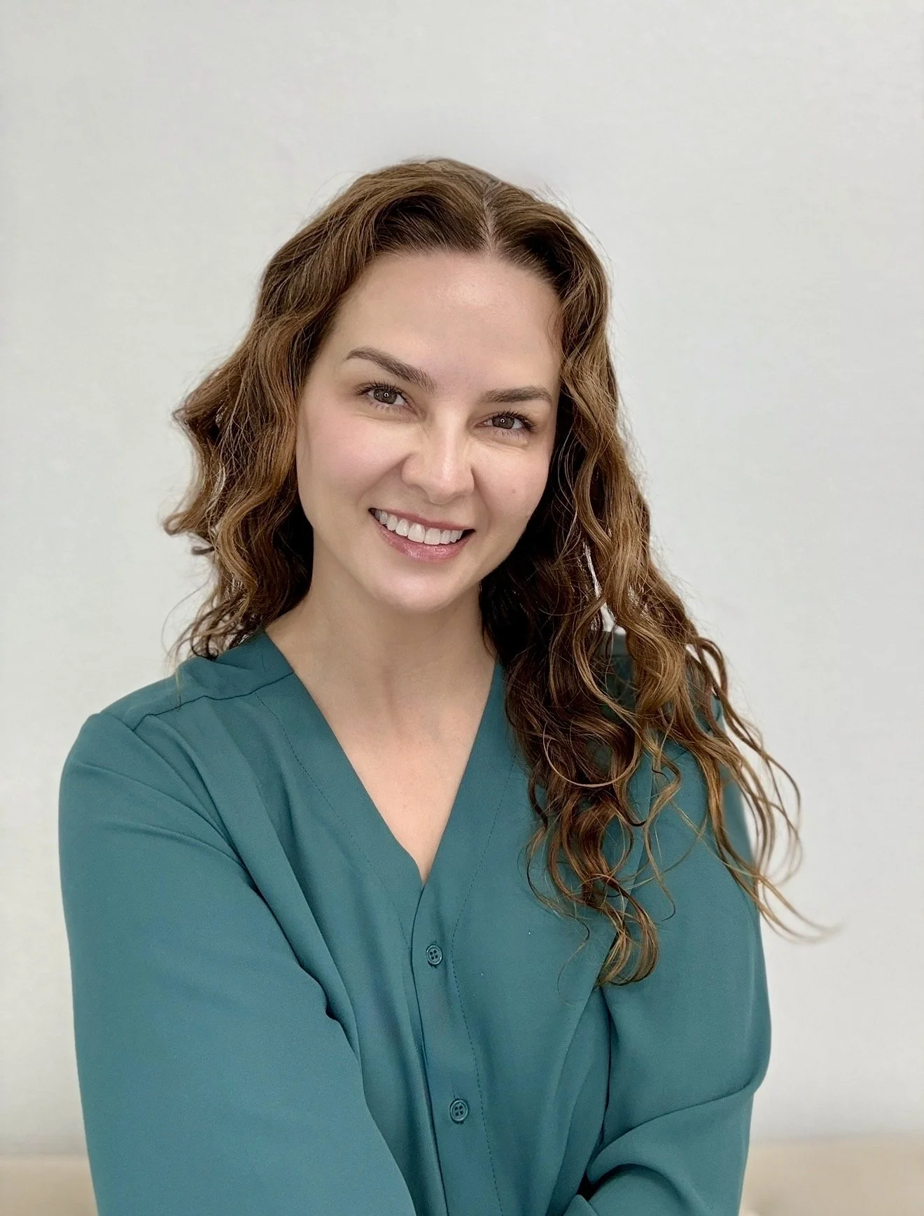 Dr. Lina Kennedy, board-certified dermatologist and founder of Grace Dermatology