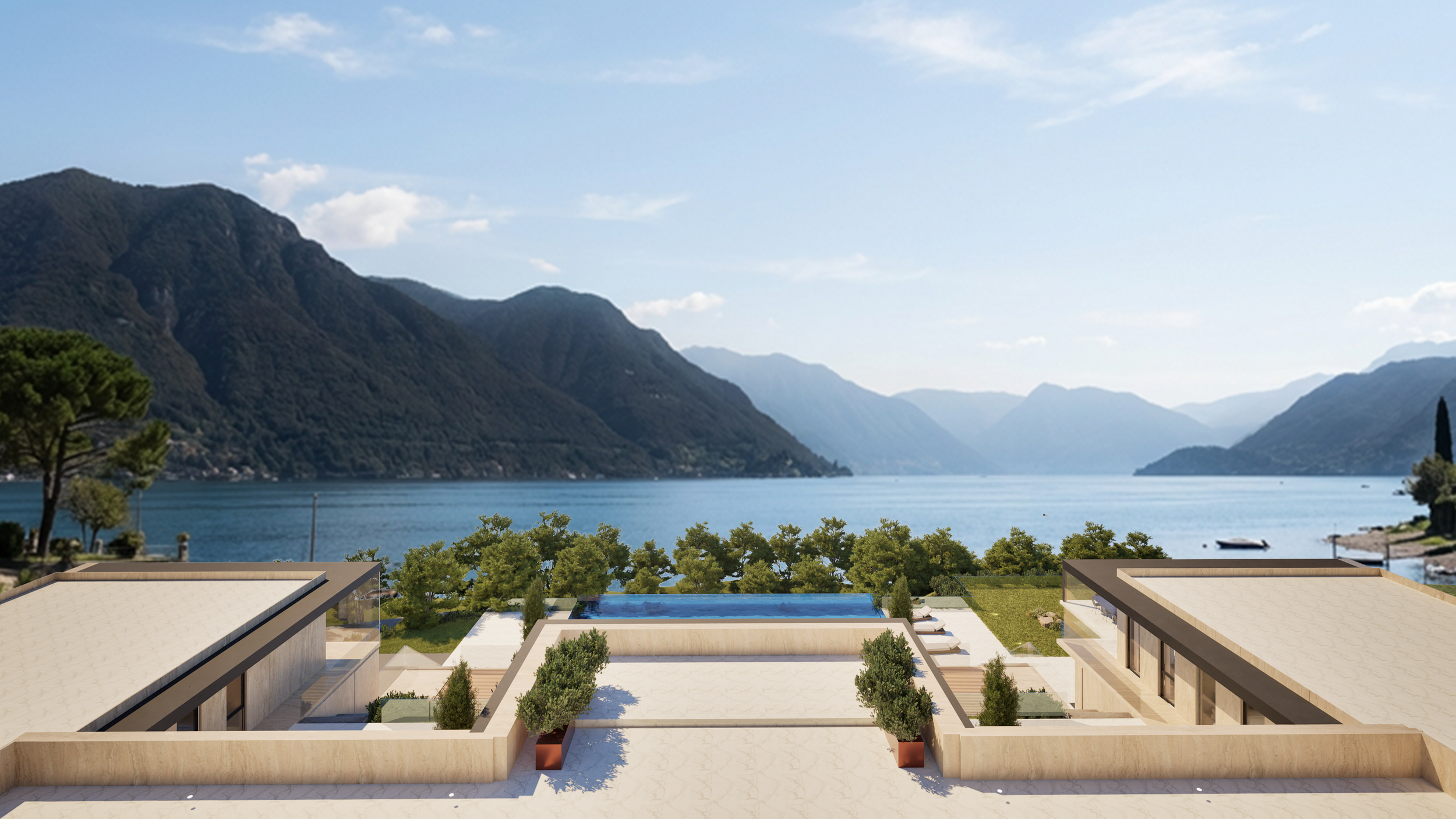 Modern building balcony with overlooking a lake and mountains, featuring a swimming pool, greenery, and seating area, under a partly cloudy sky.