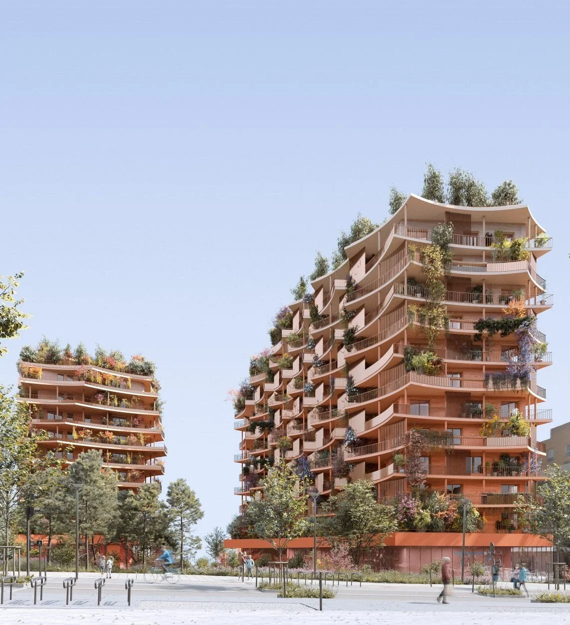 Modern multi-story residential buildings with curved balconies, surrounded by trees and people walking or biking in the foreground.