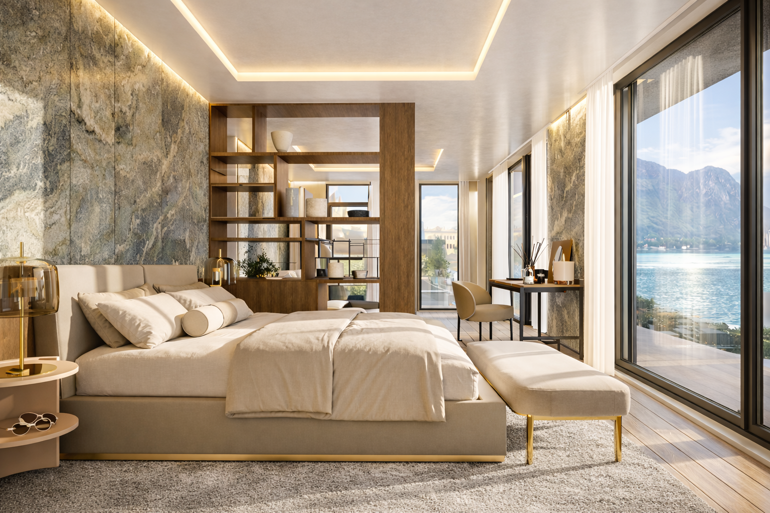 Elegant bedroom with large glass windows overlooking a body of water and mountains, featuring a beige bed with plush pillows, a wooden partition with shelves, a small desk with a chair, and decorative lamps and plants.