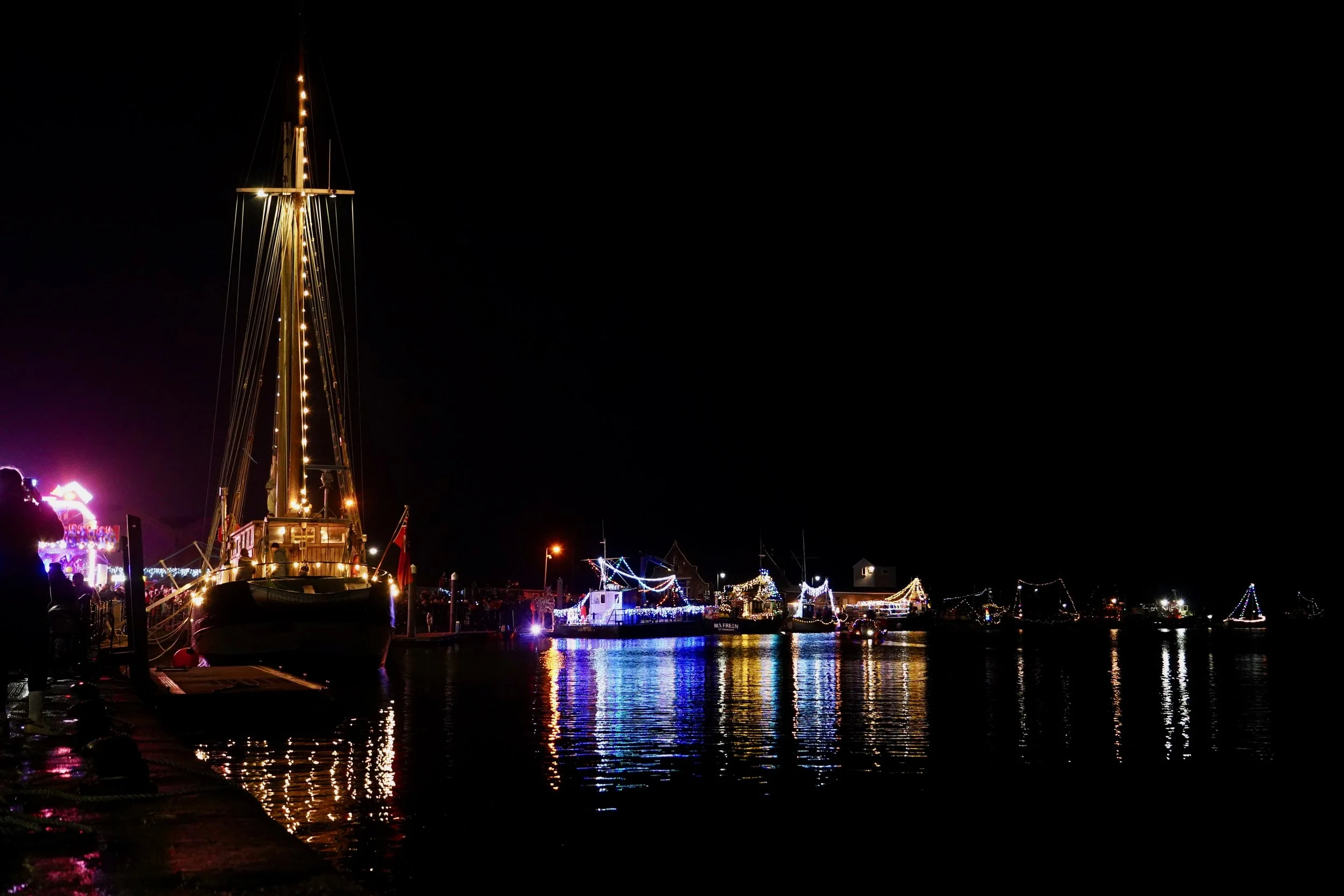 Wells Winter Tide festival Christmas light show boat parade and fireworks