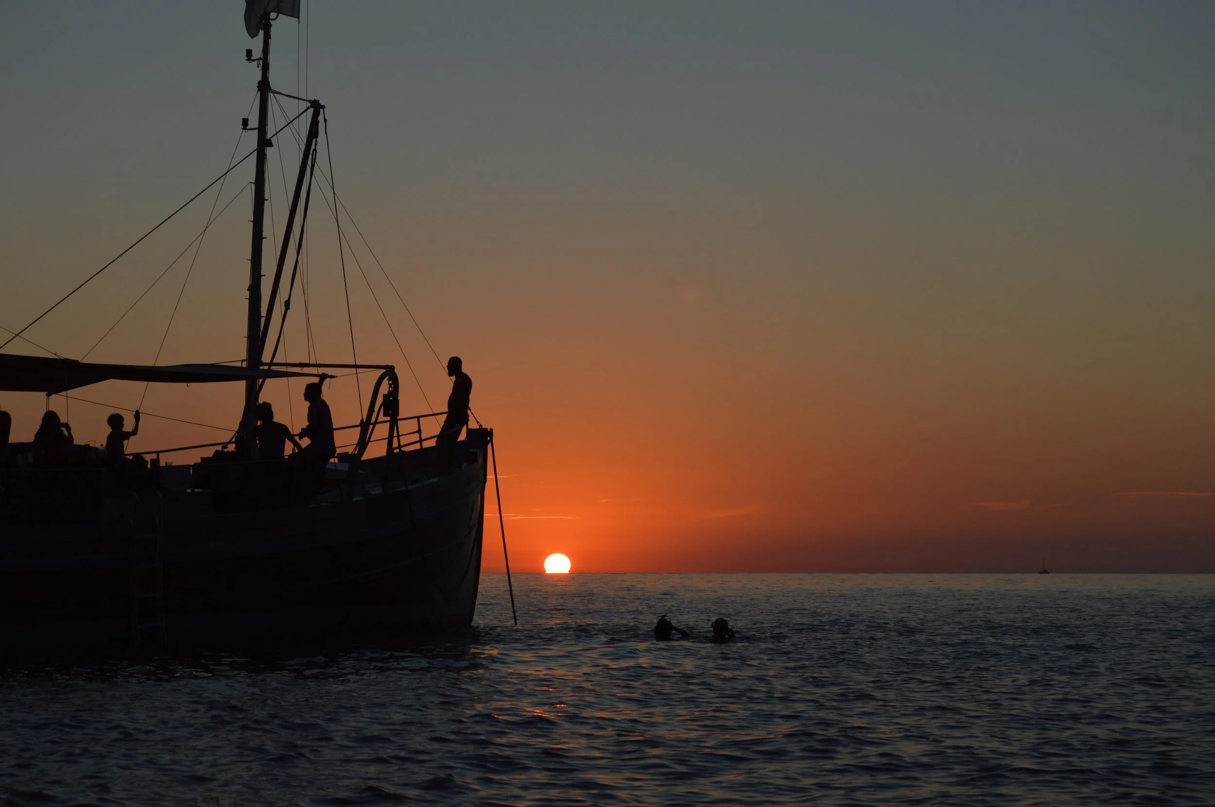 Bonnie Lass silhouette sunset swimmers