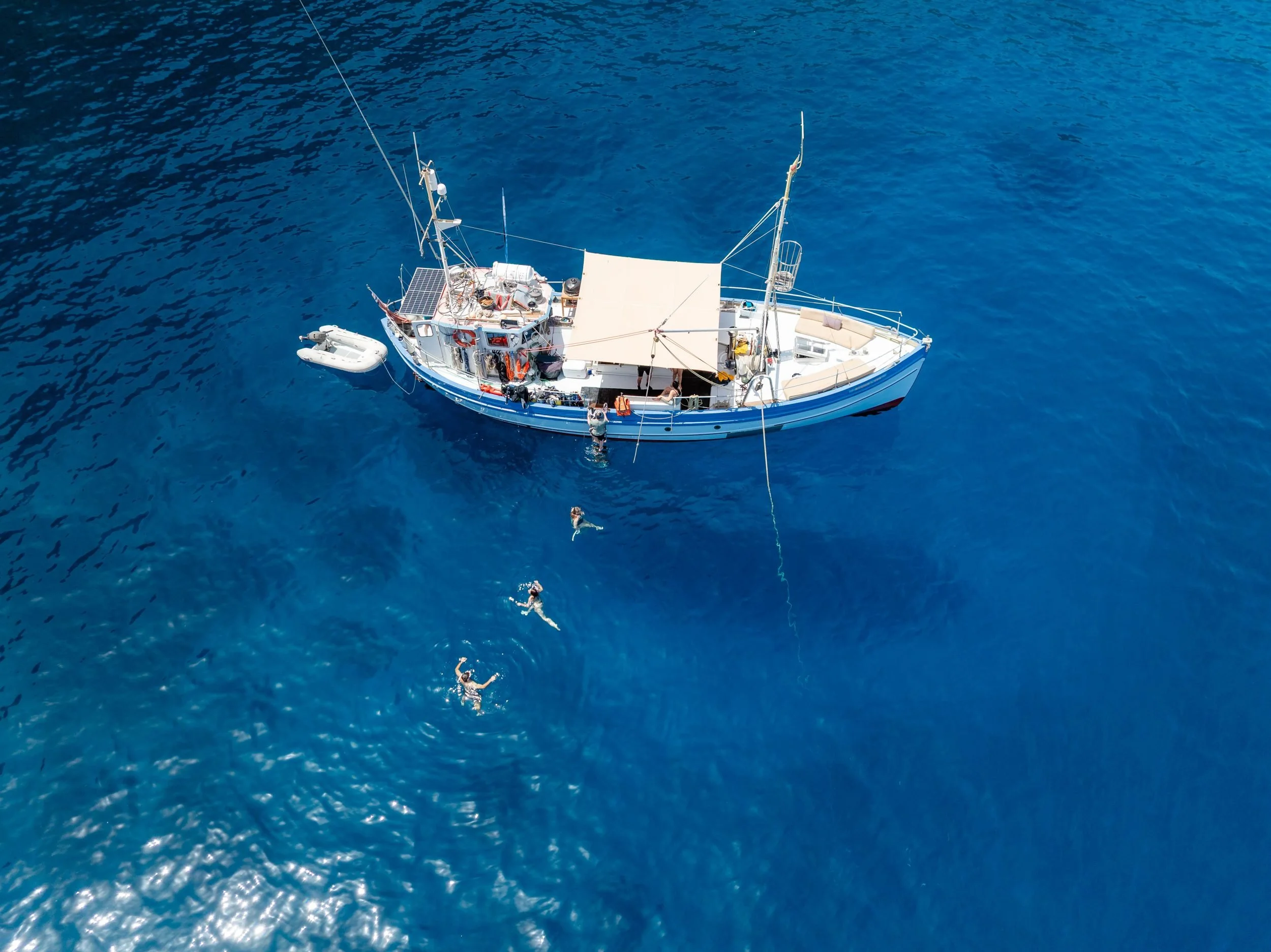 Drone view Bonnie Lass turquoise water swimmers