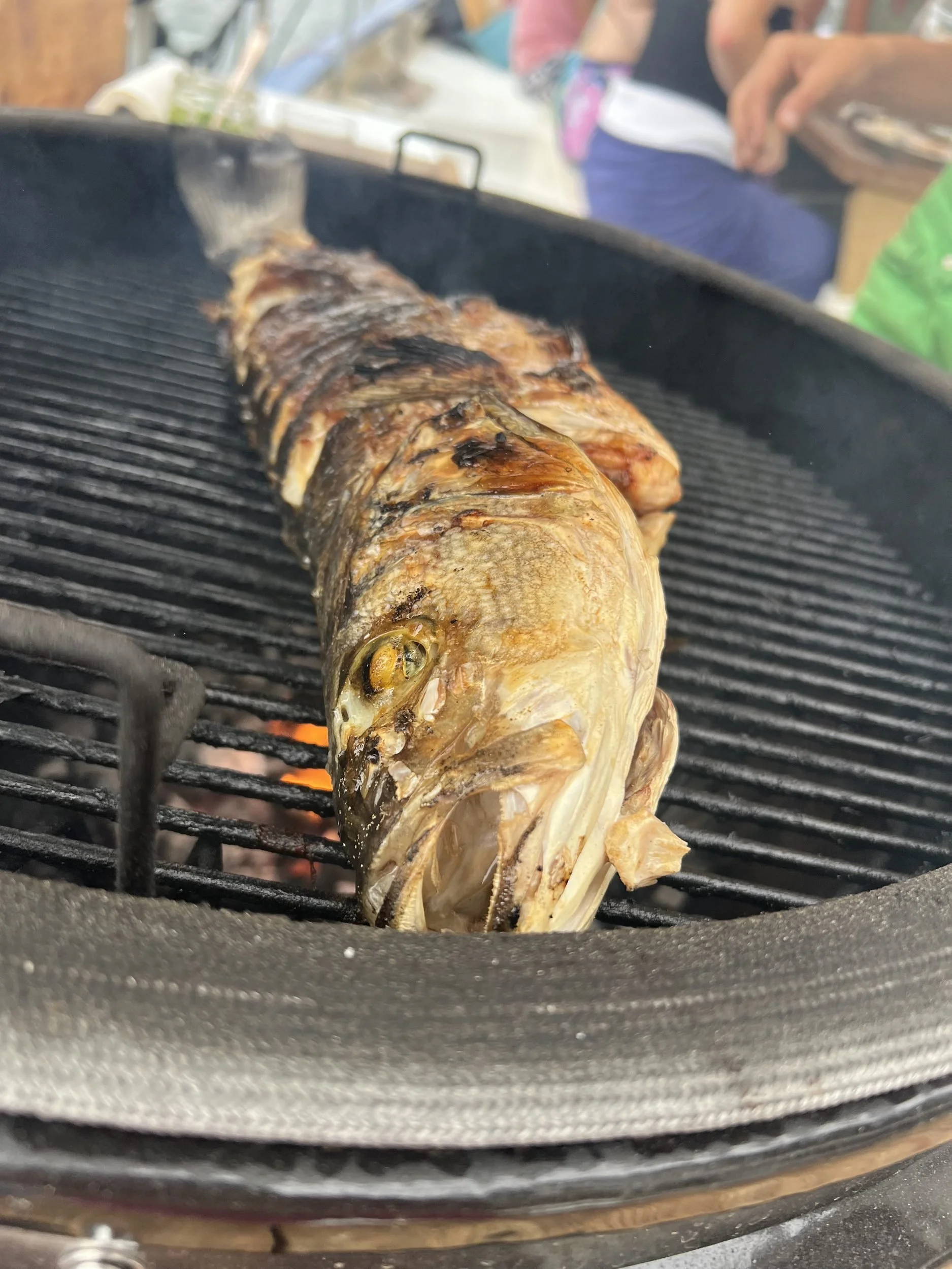 Grilled whole fish charcoal BBQ boat