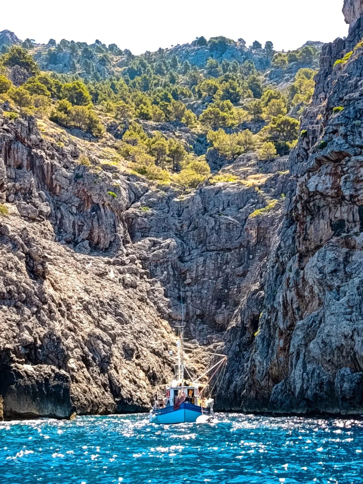 Boat in gorge Tramuntana coast expedition