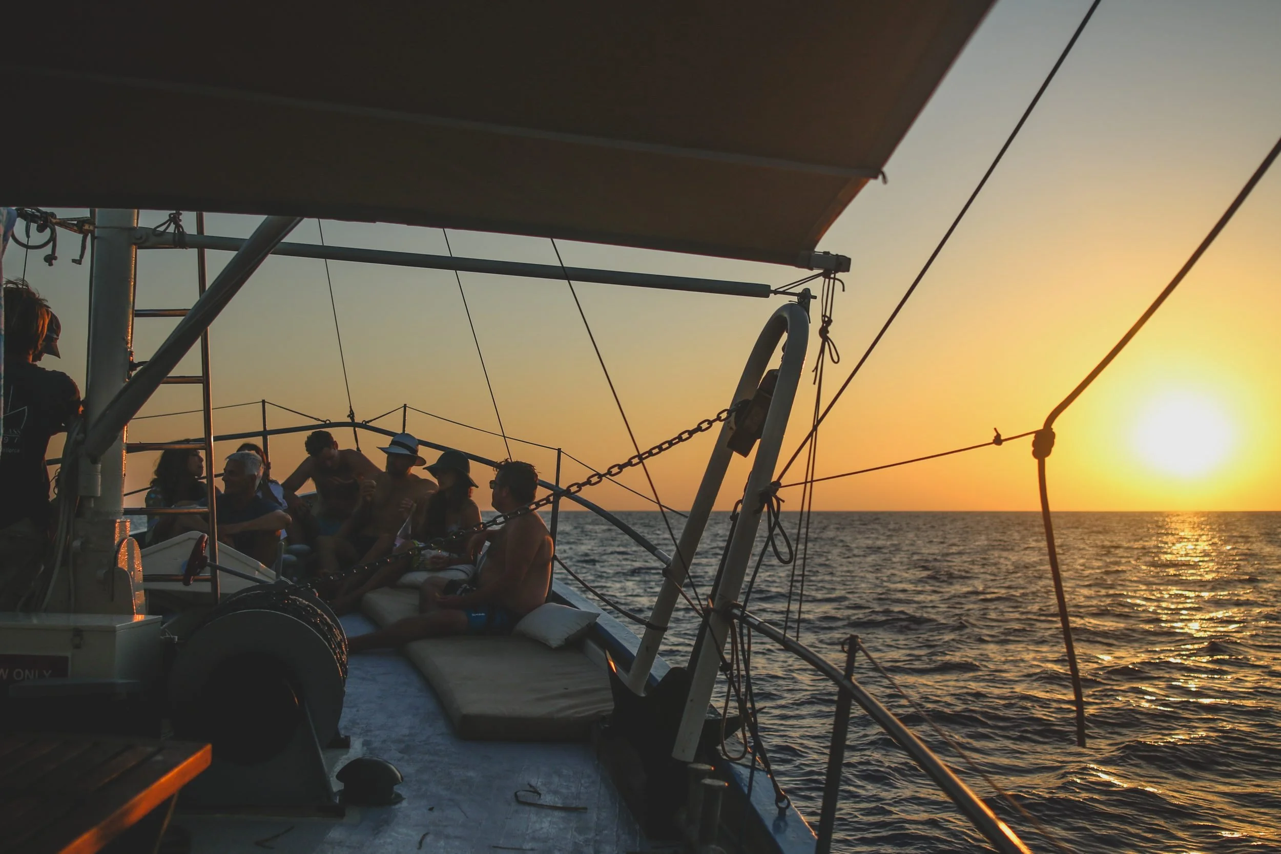Guests on deck at sunset Bonnie Lass
